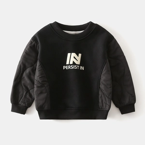 Detail of boys' black sweatshirt with quilted long sleeves and white printed lettering