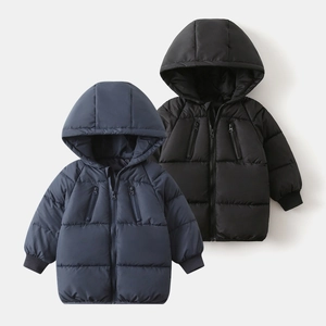 Detail of kids hooded puffer coats in navy and black with windproof cuffs and zip pockets