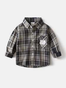 Kids long sleeve plaid shirt in dark blue and beige with chest pocket and label