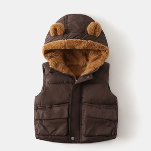 Detail of hooded kids puffer vest with bear ears and soft faux shearling lining