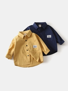 Boys' long-sleeve cotton shirts in yellow and navy with stylish sport label accents