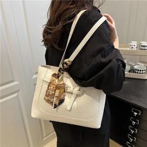 Minimalist white crocodile pattern tote bag with decorative silk scarf for daily commute