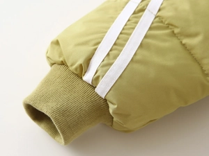 Close-up of olive green kids puffer jacket sleeve with white stripes and ribbed cuffs