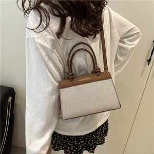 Sac à main rétro minimaliste en cuir marron et tissu blanc avec bandoulière