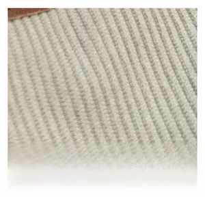 Detailed macro view of the cream corduroy fabric texture with soft vertical stripes