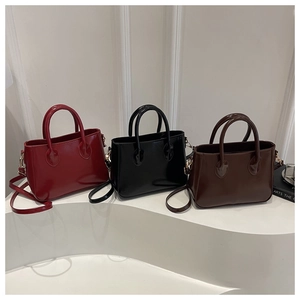 Minimalist glossy leather mini square bags in red, black and brown with gold hardware