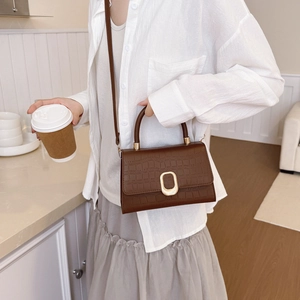 Dark brown faux crocodile leather crossbody bag with elegant gold metal buckle hardware