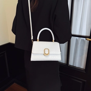 White croc-effect square crossbody bag with gold metal buckle and top handle for women