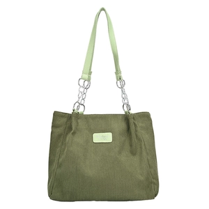 Minimalist olive green corduroy tote bag with leather handles and decorative metal chain