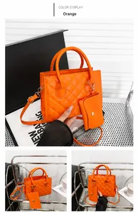 Dettaglio del set borsa trapuntata arancione con piccolo portamonete coordinato e tracolla