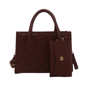 Deep reddish brown quilted handbag with matching coin purse and golden hardware accents