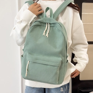 Mint green corduroy backpack for women featuring large capacity and soft striped texture