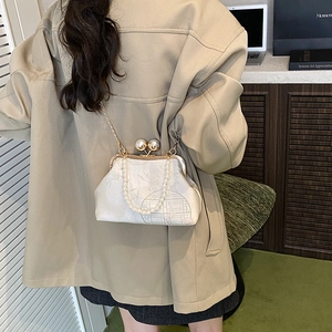 Pink sakura jacquard evening bag with pearl handle and golden chain strap crossbody