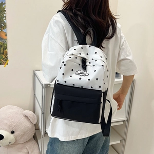 Sac à dos stylé noir et blanc à imprimé étoiles pour étudiantes à grande capacité