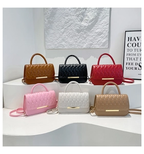 Multiple colors of quilted PU handbags with elegant gold metal locks and texture detail