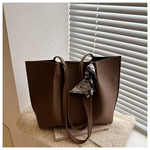 Brown PU leather tote bag with elegant black and white silk scarf accessory