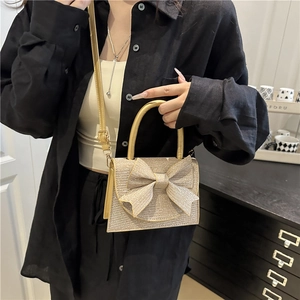 Sac à main de soirée chic champagne doré avec nœud scintillant pour mariages et fêtes