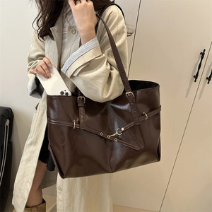 Deep brown large capacity faux leather tote bag with gold buckle and cross straps