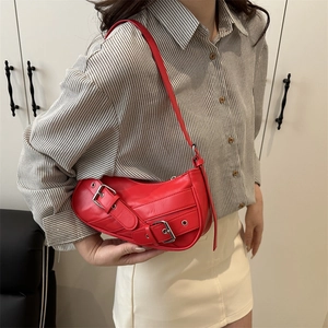 Chic red leather baguette shoulder bag with silver hardware and rock style studs