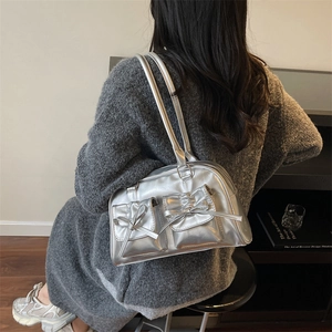 Silver metallic large capacity handbag with bow details and stylish shoulder straps