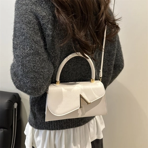 Elegant white PU evening clutch bag with gold V-metal buckle and thin shoulder strap