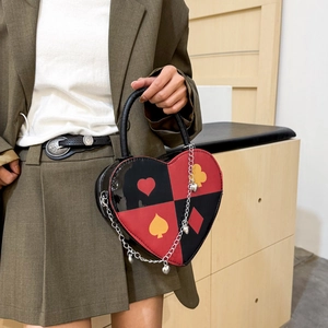 Chic heart-shaped handbag with poker pattern print and silver chain tassel detail