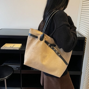 Minimalist large capacity khaki suede tote bag with black straps for casual daily commute