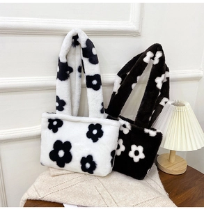 Close-up of plush tote bag texture with flower patterns and cozy home decor background