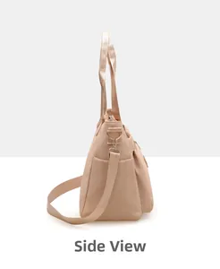 Detailed side view of high-capacity nylon shoulder bag showing thickness and strap detail