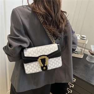 Classic plaid shoulder bag for women featuring vintage metal buckle and gold chain strap