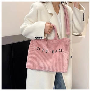 Pink corduroy tote bag with TOTE BAG embroidery and adjustable shoulder strap