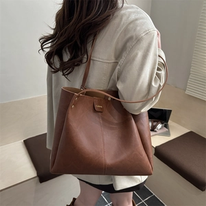 Brown leather tote bag for women with minimalist retro design and large capacity for daily use