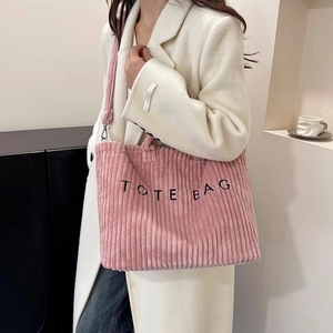 Pink corduroy large capacity tote bag with black TOTE BAG letter embroidery on shoulder