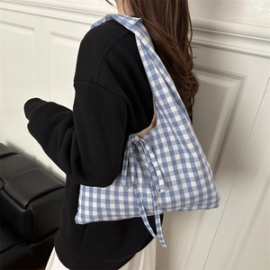 Blue and white checkered canvas tote bag for women featuring a stylish side bow ribbon