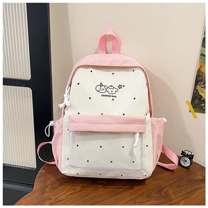 Pink polka dot school bag featuring a transparent PVC pocket and cute cartoon prints