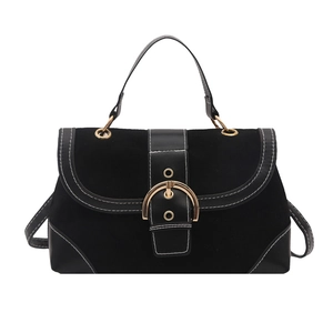Vintage black crossbody bag with suede and leather textures and white contrast stitching