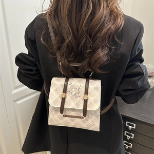 Sac à dos à carreaux beige et violet pour femme avec bordures en similicuir marron
