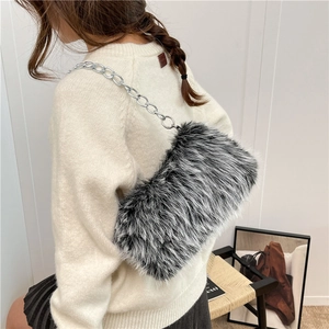 Fuzzy faux fur shoulder bag with silver chain strap and stylish monochrome plush texture