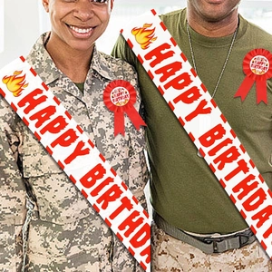 Firefighter birthday party set with red Happy Birthday sash and matching badge for kids
