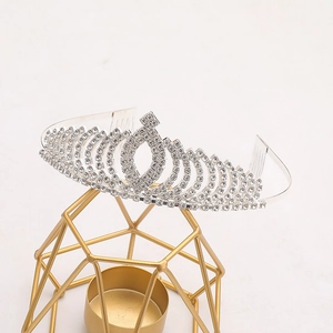 Exquisite bridal rhinestone crown with silver metal frame and sparkling crystal accents