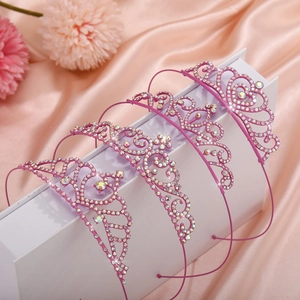 Pink rhinestone princess crown headband set for girls displayed on elegant silk background