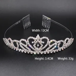 Elegant silver-tone rhinestone tiara for kids with heart and scroll patterns, 12cm wide