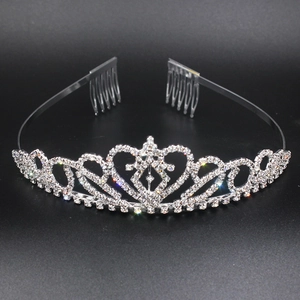 Close-up of silver tiara with heart motif and sparkling rhinestones for bridal hairstyle