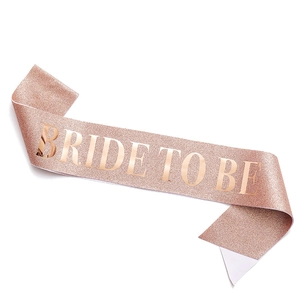 Rose gold glitter sash with Bride to Be text for bridal shower and wedding party decor