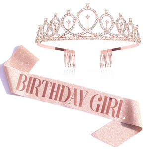 Detail of rose gold rhinestone tiara and pink glitter sash with Birthday Girl lettering