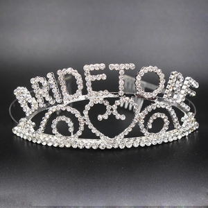Detail of silver rhinestone crown featuring Bride To Be letters and heart patterns