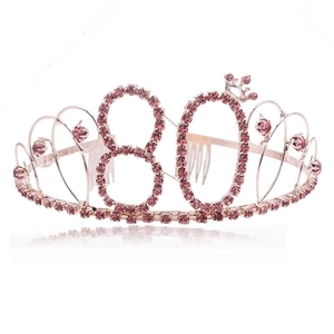Dettaglio della tiara numero 80 in oro rosa con strass rosa e pettine per capelli