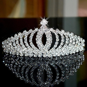 Luxurious bridal tiara with sparkling rhinestones in a heart-shaped silver metal frame