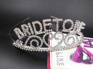 Detailed view of silver crystal bride to be tiara with hair combs for bridal parties