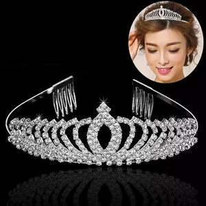 Elegant bridal tiara with sparkling rhinestones and side combs on black background